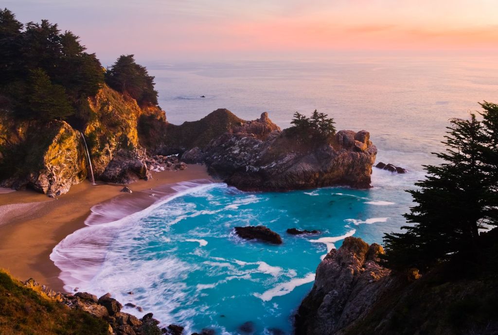 The thin stream of McWay Falls takes backseat to the dramatic rocky cove studded with pines.
