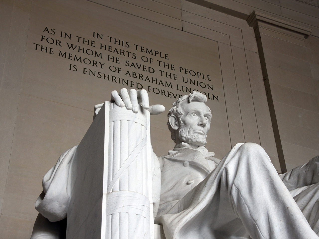 Looking up at the sculpture of Abraham Lincoln at the Lincoln Memorial.