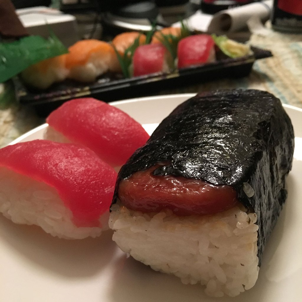 Spam musubi and sushi on a plate