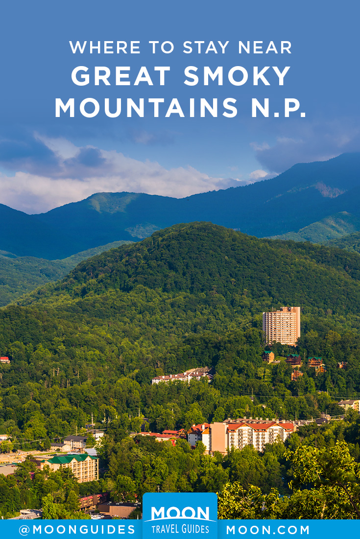 landscape view of gatlinburg with overlaid text reading where to stay near great smoky mountain national park