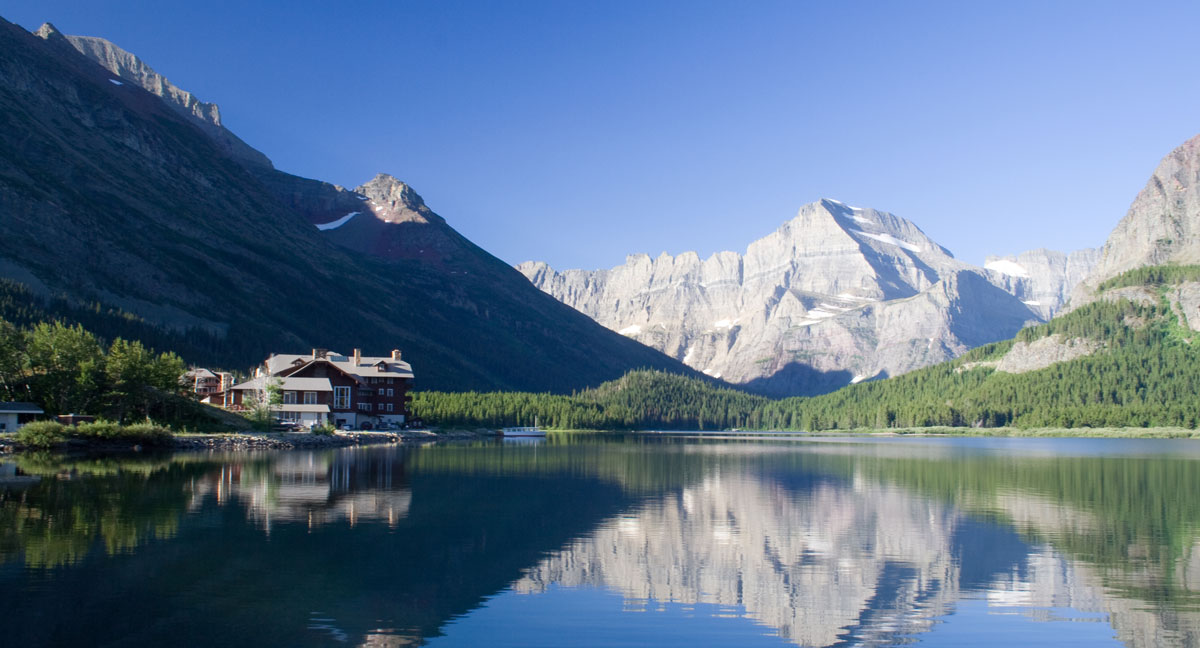tranquil mountain lake scene in glacier national park
