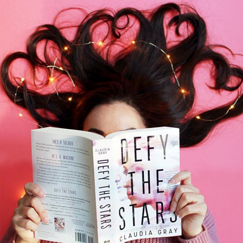Instagram image of book cover for 'Defy the Stars' by Claudia Gray