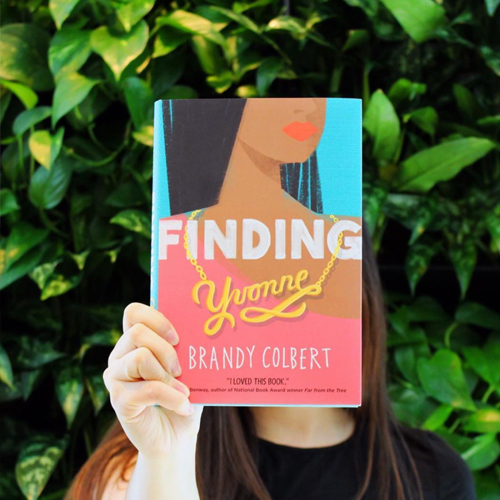 NOVL - Instagram image of woman holding up a copy of 'Finding Yvonne' by Brandy Colbert