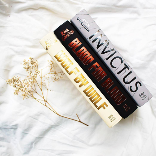 NOVL - Instagram image of book spines of books by Ryan Graudin, featuring 'Invictus'