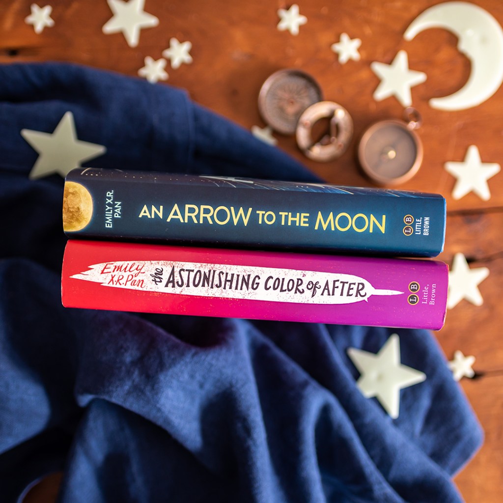 Instagram image of the book "An Arrow to the Moon" and "The Astonishing Color of After" by Emily X.R. Pan