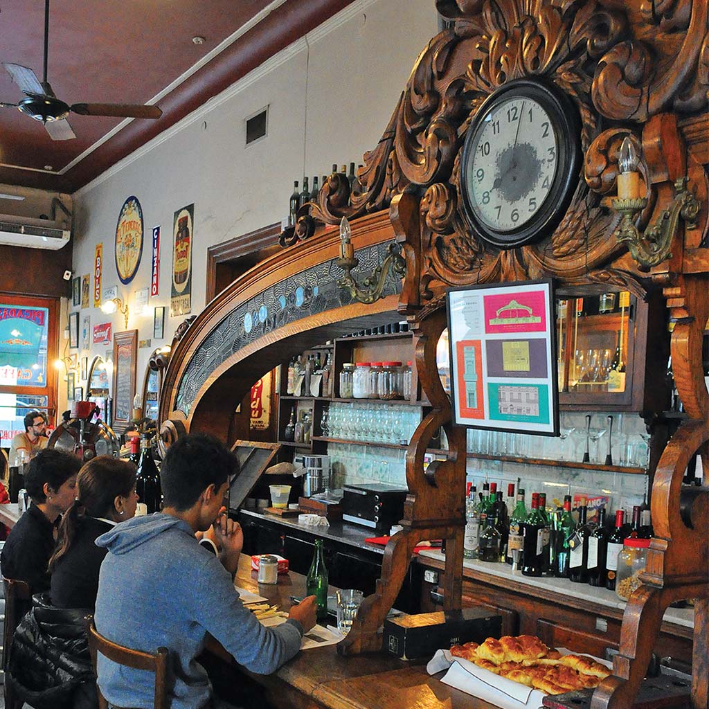 The elegant and decorative wooden bar at El Federal.