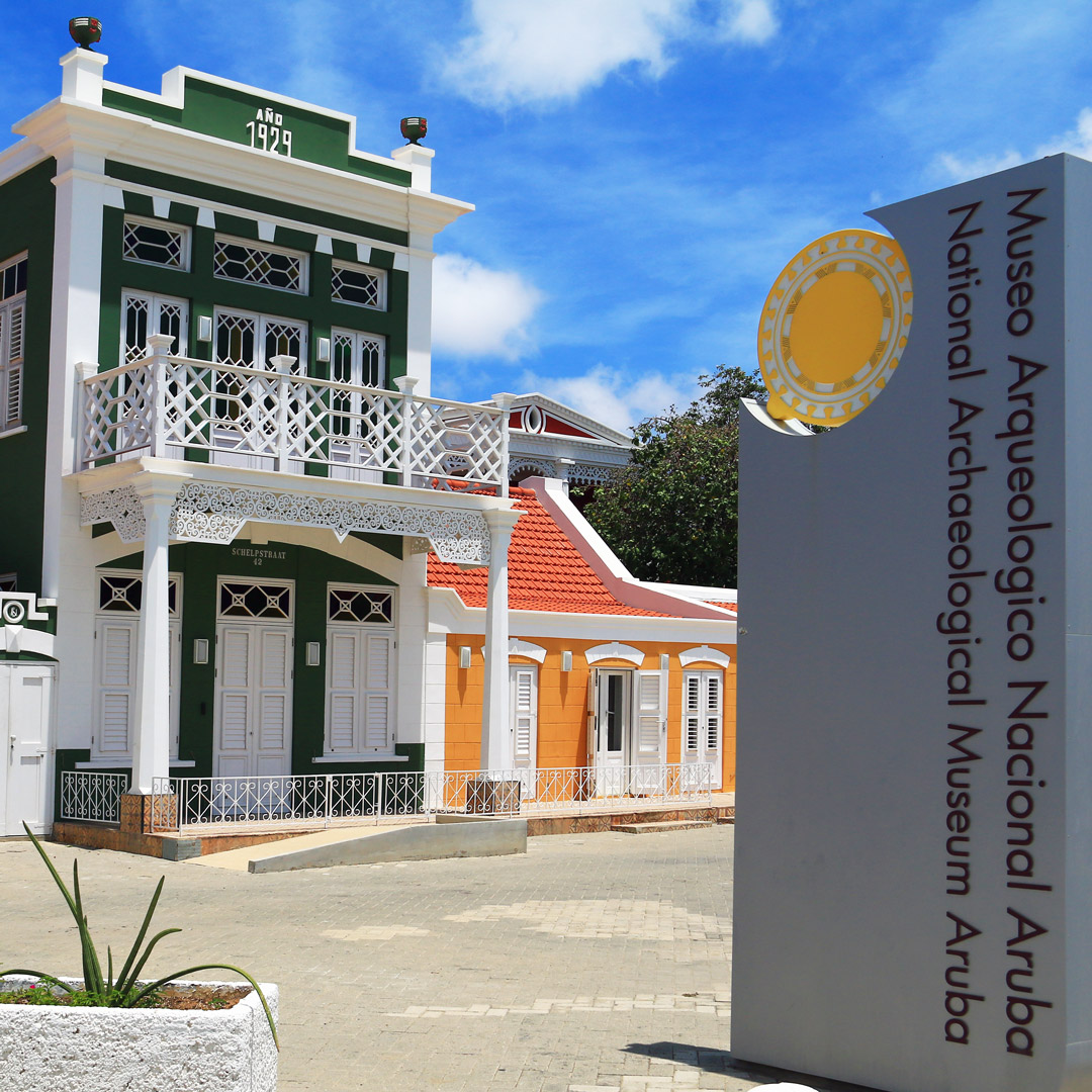 sign and front of building of the National Archaeological Museum Aruba