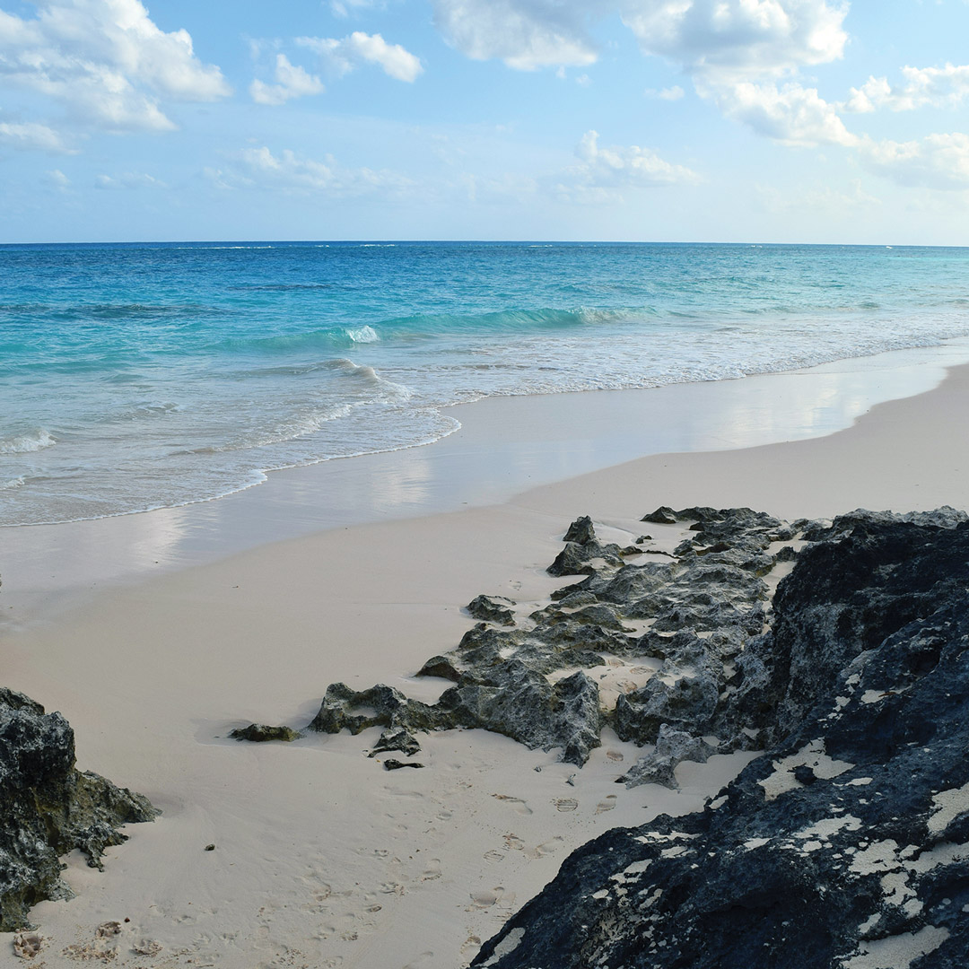 calm waves on the shore of Elbow Beach in Bermuda