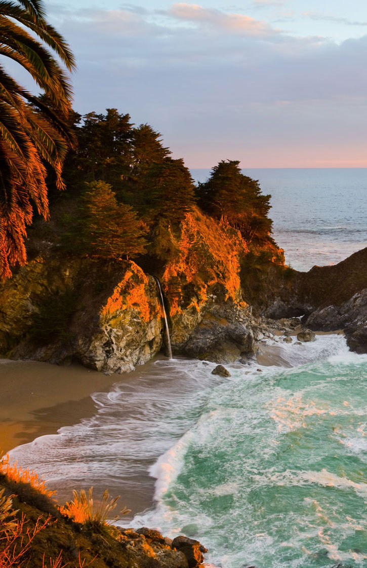 McWay Falls in Big Sur pouring directly into the Pacific ocean.