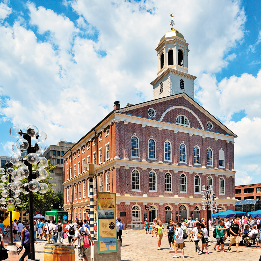 plaza full of people in front of faneuil hall