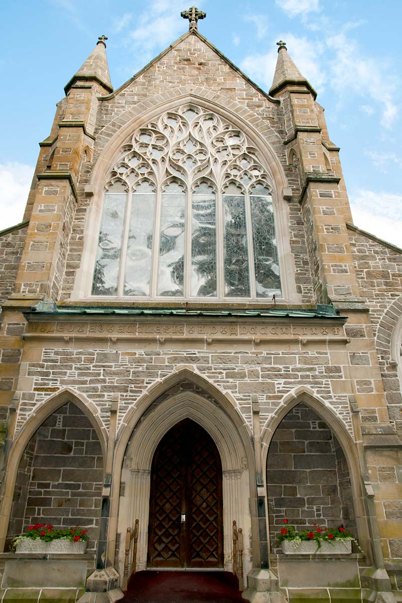 Exterior view of magnificent stained glass windows at Fredericton's Christ Church Cathedral.