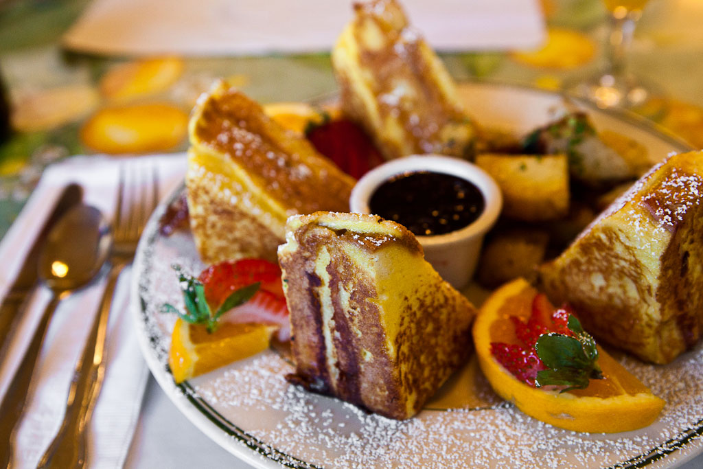A beautifully arranged plate of french toast.