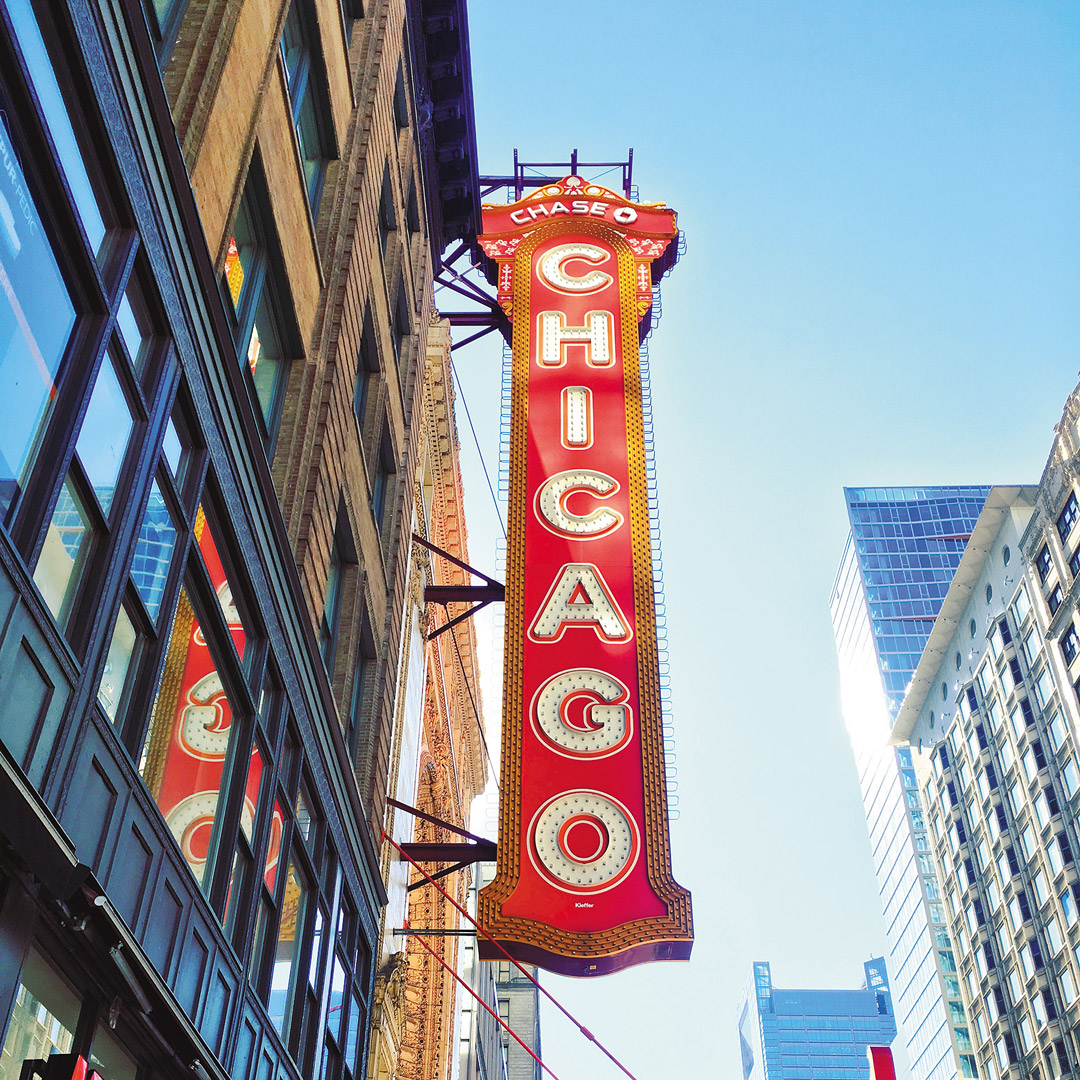 red marquis sign over the Chicago Theater