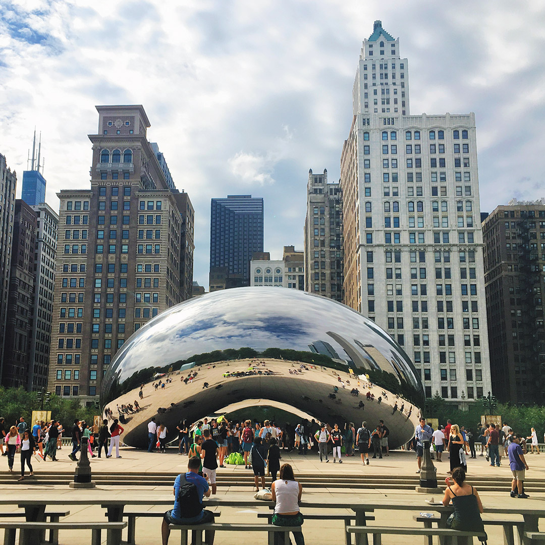 public art shaped like a bean in front of skyscrapers in Chicago's Loop
