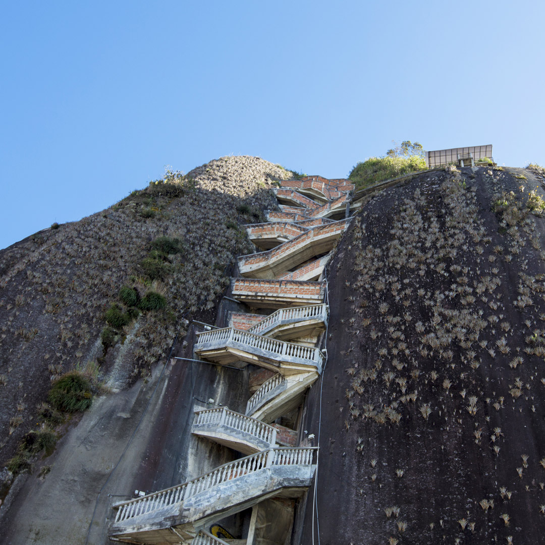 view from below of steep stairs from La Piedra Penol in Colombia