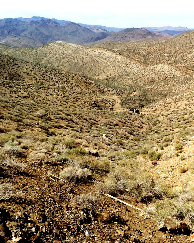 ruins scattered across steep hills