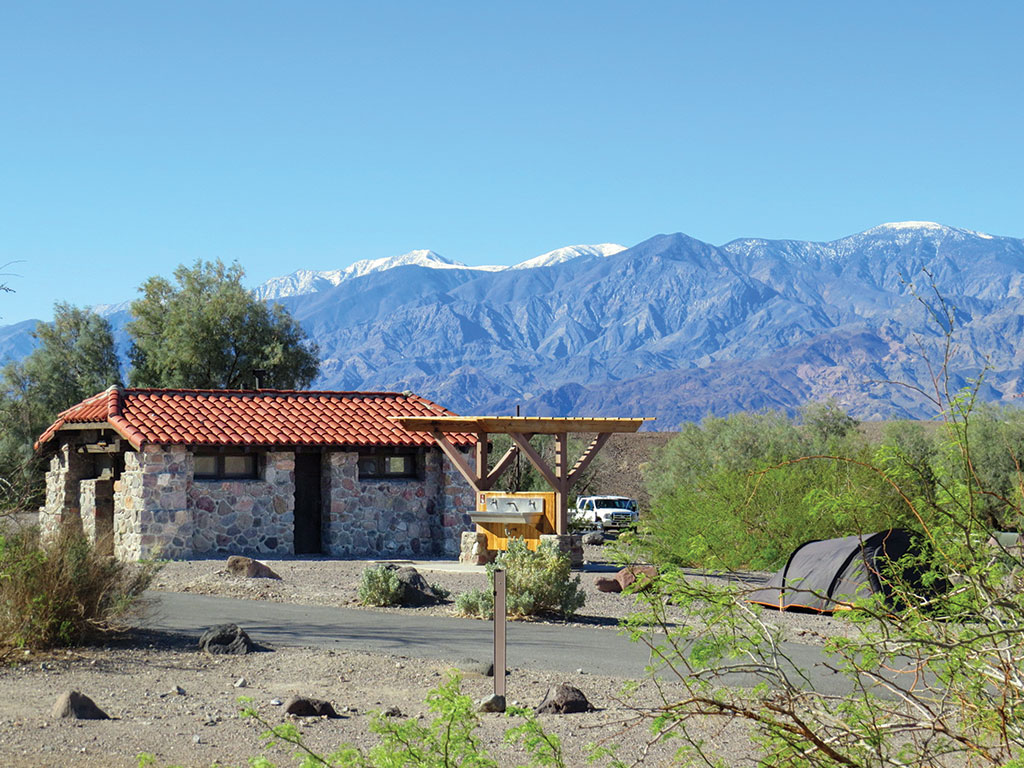 bathrooms and a tent in a Furnace Creek campground Death Valley