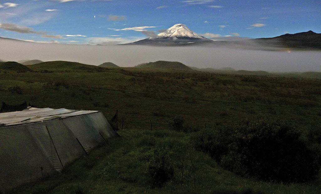 Cotopaxi and the surrounding peaks as seen from the Secret Garden Cotopaxi hotel. Photo © Florian Lasnes. 