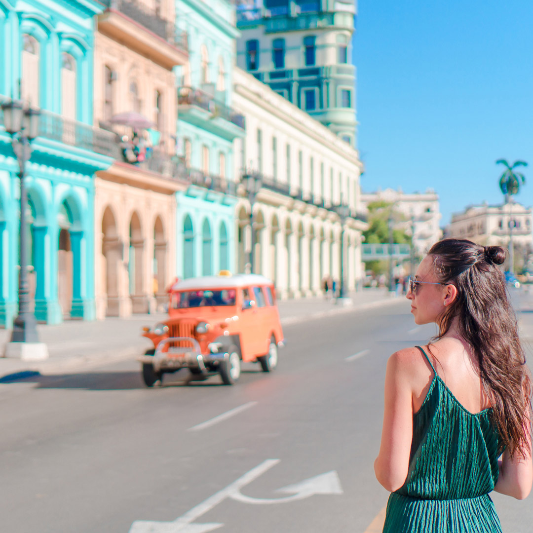 woman standing on a street in Havana
