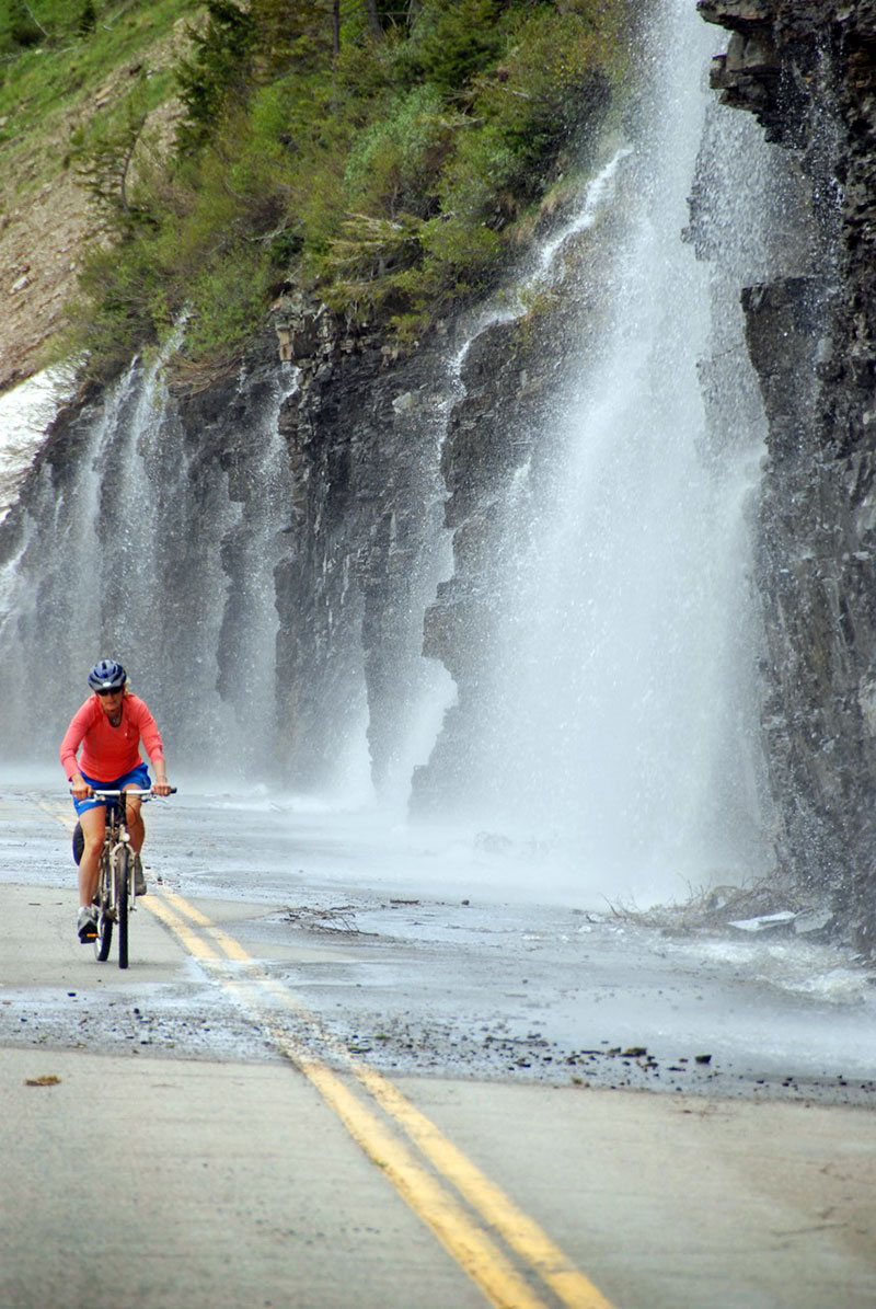 Biking along Glacier National Park's Weeping Wall.