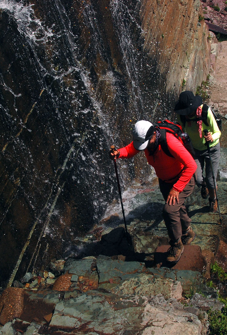 Water courses down rocky slopes on the way to Grinnell. 