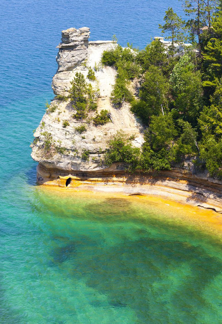 Turquoise water at the shore at Pictured Rocks National Lakeshore.