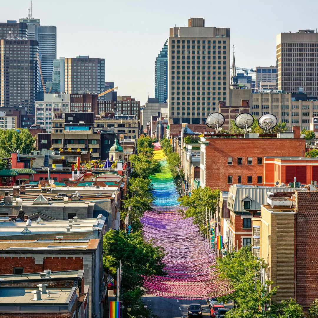 aerial view of the rainbow-colored decor lining the streets in the Village neighborhood in Montreal