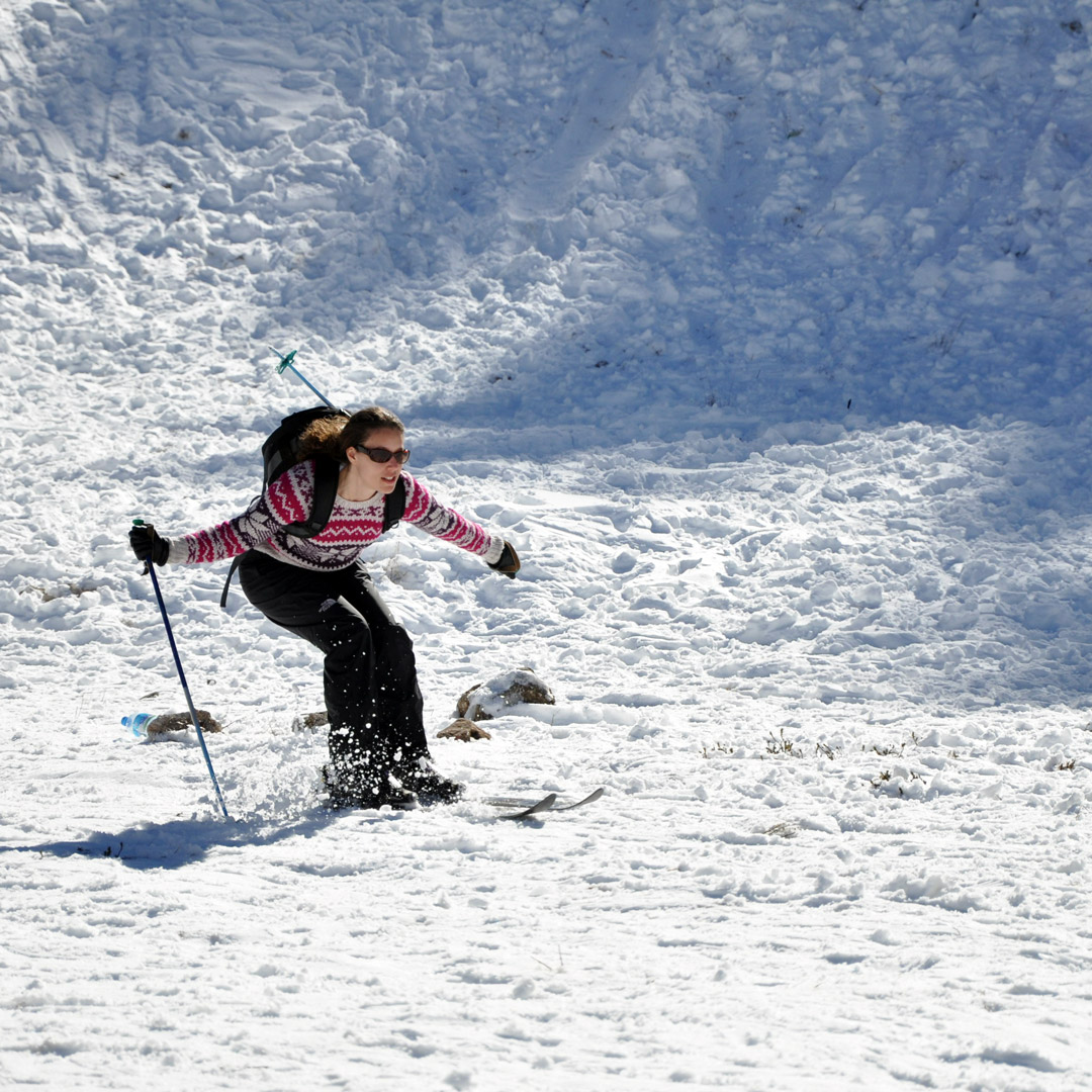 a woman skiing in morocco