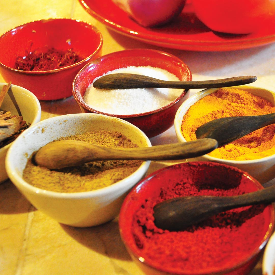 colorful array of ground cooking spices