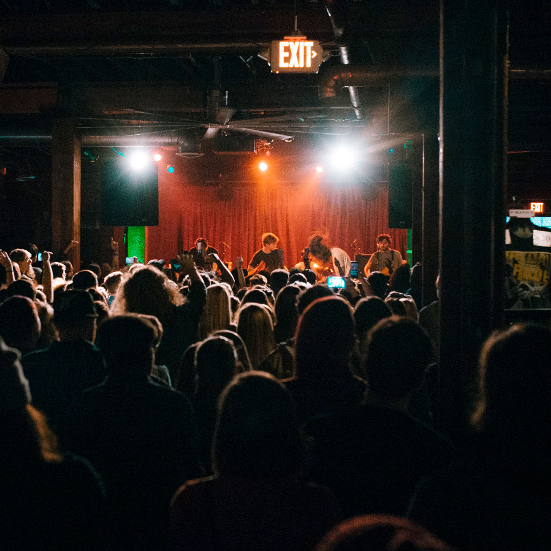 crowd of people watching a band perform at Mercy Lounge in Nashville