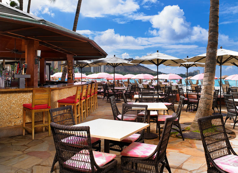 Outdoor seating at the Mai Tai Bar on Waikiki Beach.