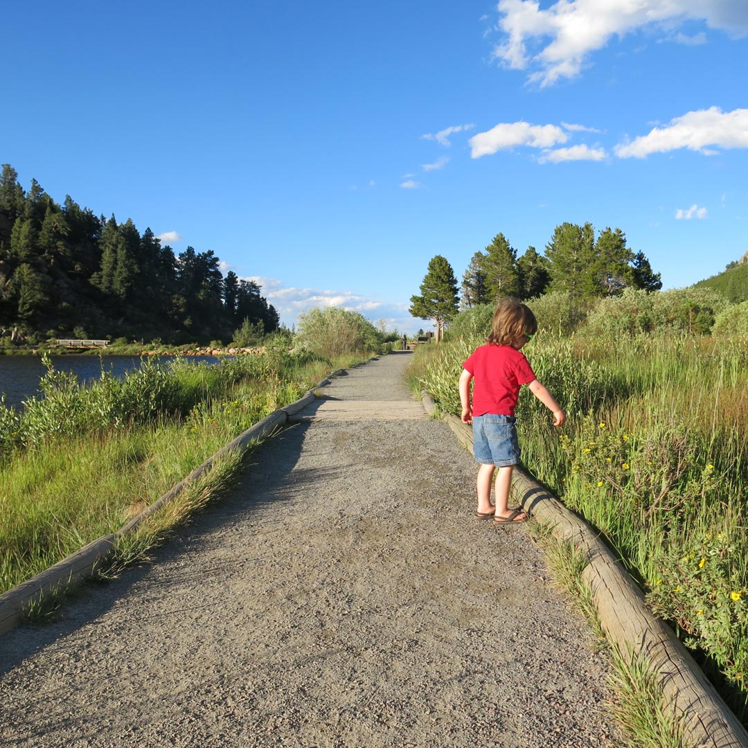 child walking on a path at Lilly Lake