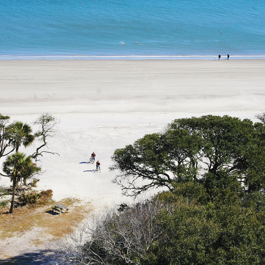 cyclists on the beach in South Carolina's Hunting Island