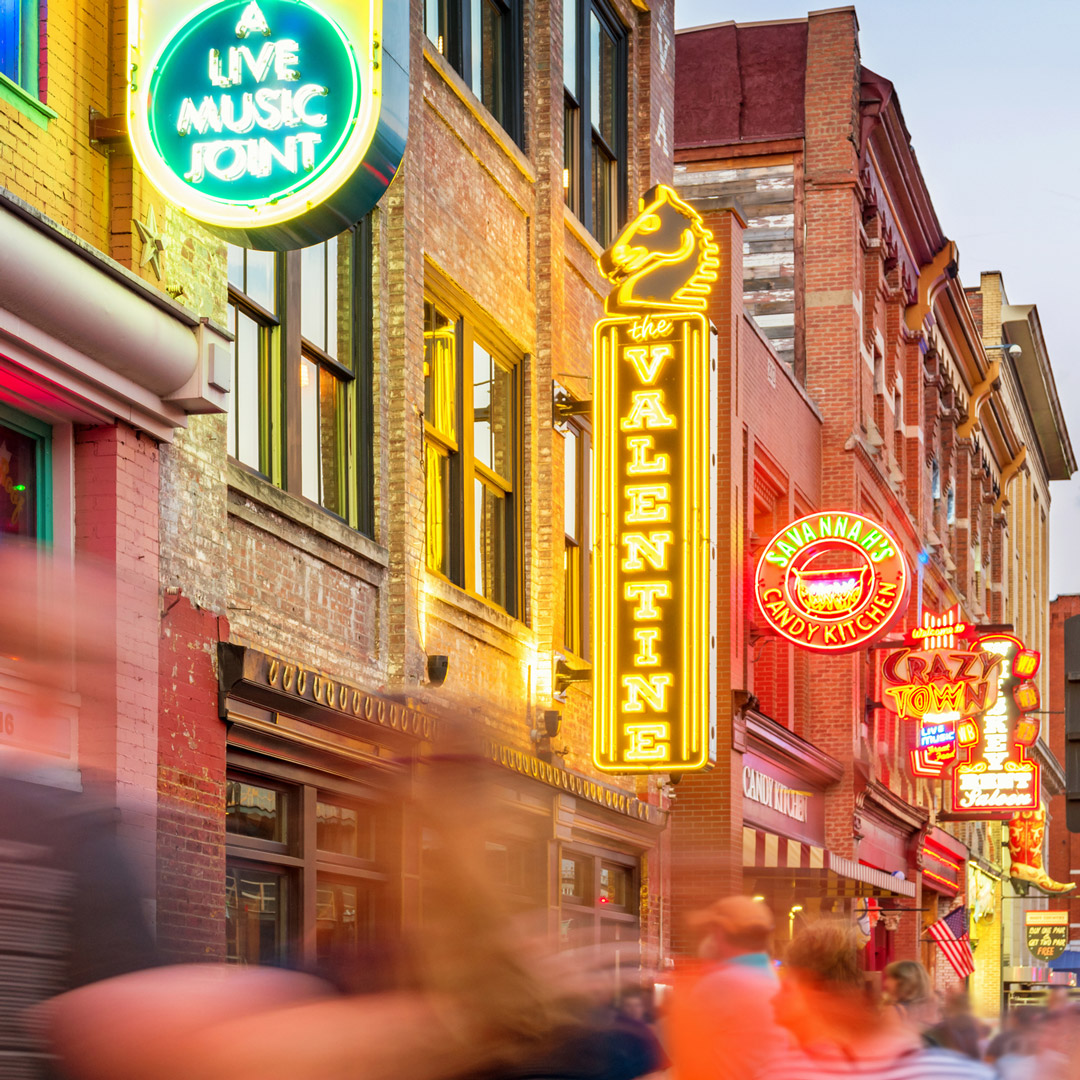 neon signs light up Broadway in Nashville Tennessee