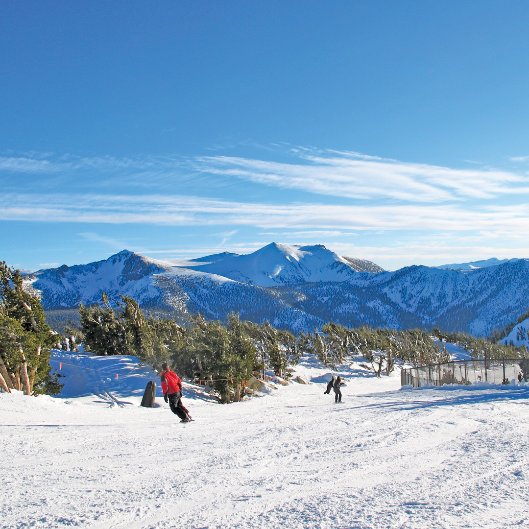 two snowboarders enjoying Heaveny ski resort in Tahoe