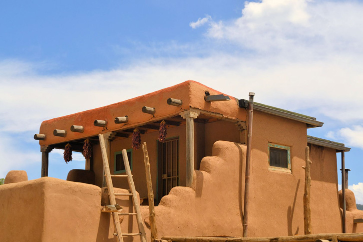 Red adobe structure at Taos Pueblo, New Mexico.