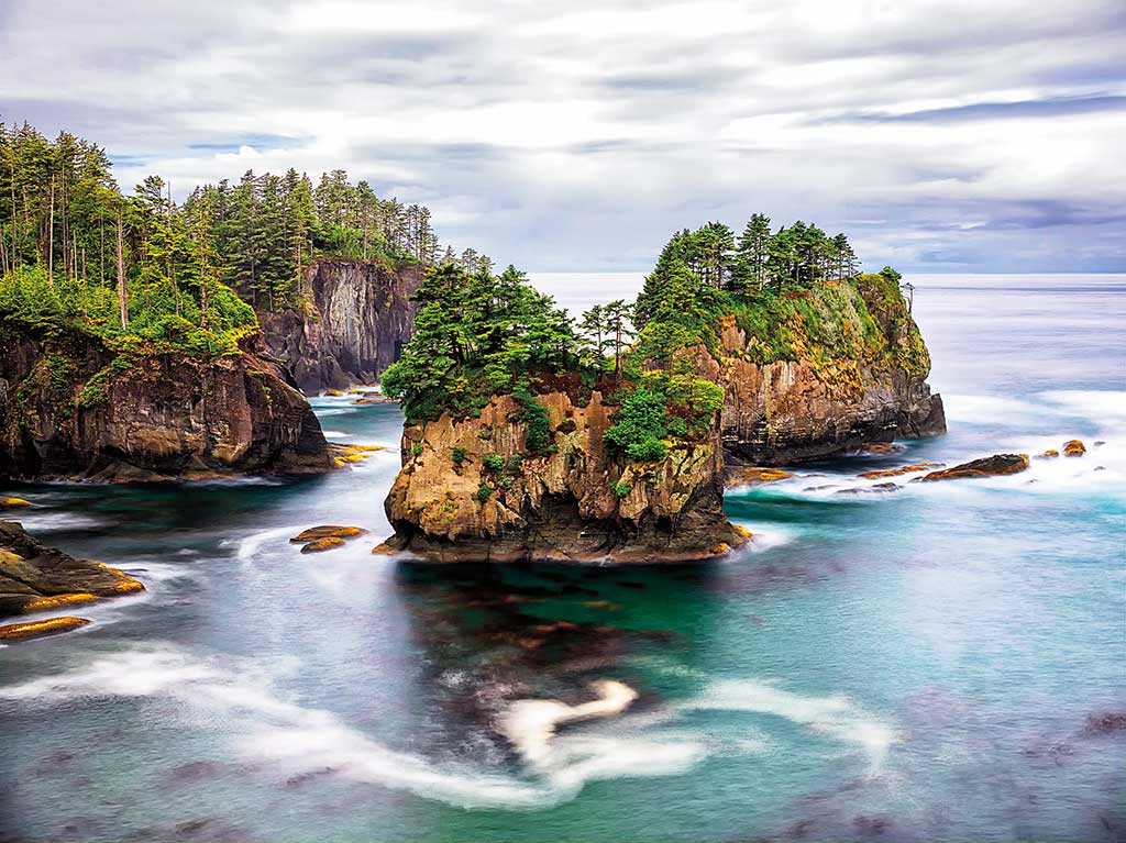 Rocks jut out of the ocean in Neah Bay