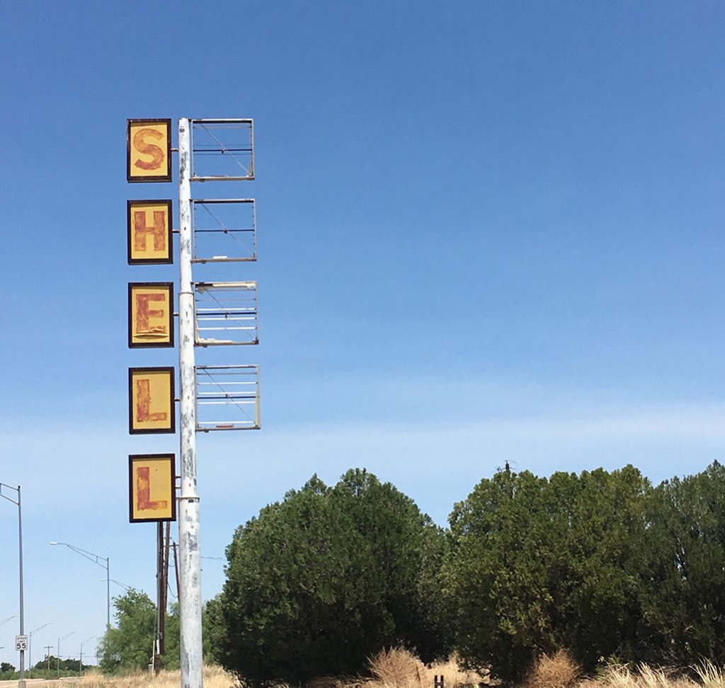 A decaying Shell gas sign is one of the many abandoned businesses along Route 66