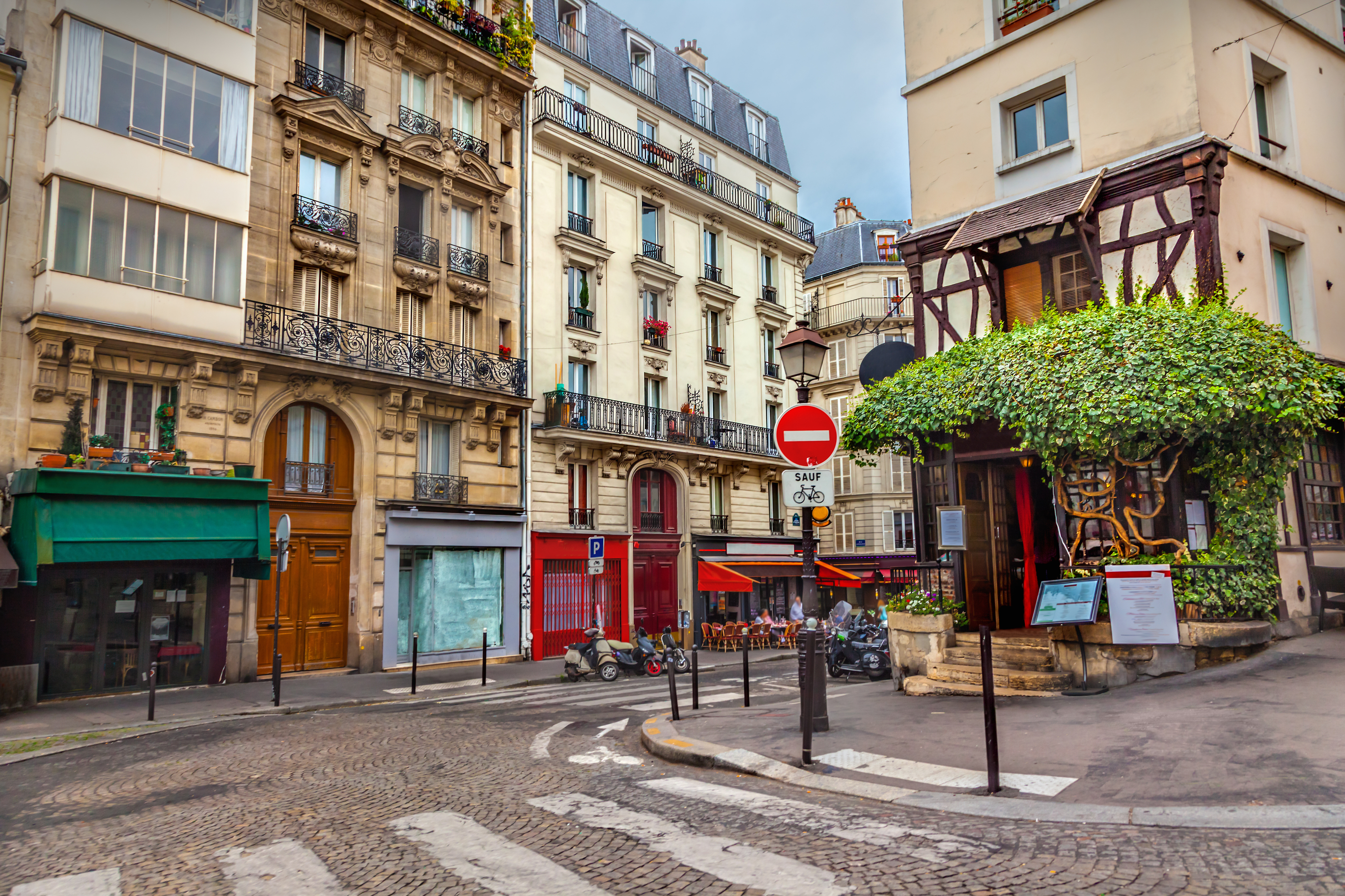 Image of cobblestone street and charming buildings in Montmartre, Paris