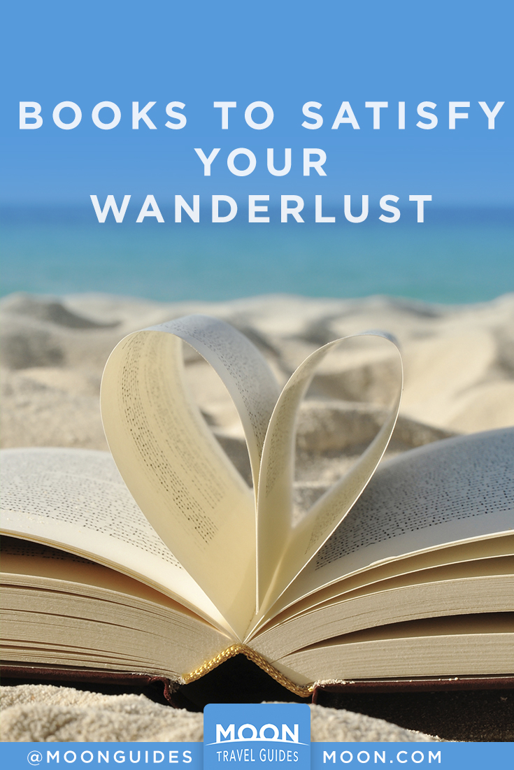pinterest graphic that reads: Books to satisfy your wanderlust. Photo of a book on the beach.