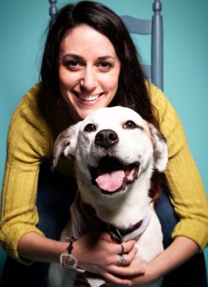 Author Amanda Davis posing with her dog