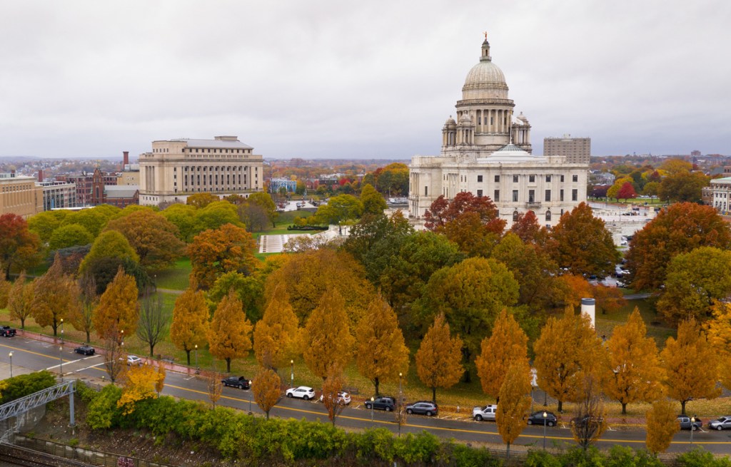 trees in amber hues surrounding the capitol building in providence