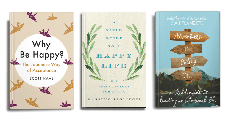 three books on mental health and happiness on a white background