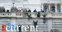 Image of January 6th Mob Scaling Capitol Wall