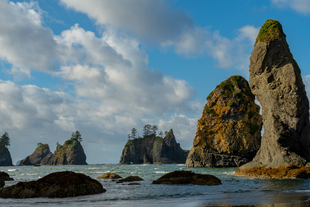 Point of the Arches at Shi Shi Beach in Olympic National Park with gloomy clouds and ocean view.