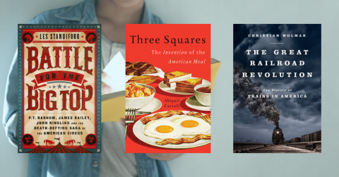 3 Unusual Books on a Background with Someone Reading