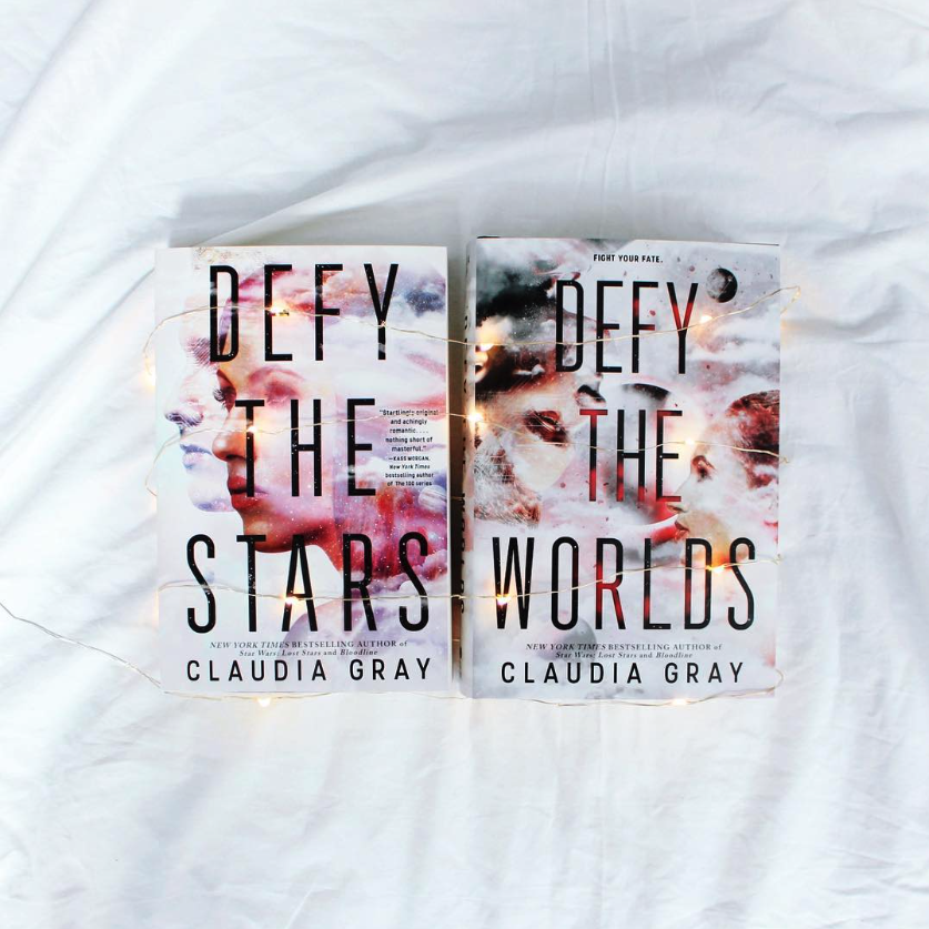 Instagram image of the books 'Defy the Stars' and 'Defy the Worlds' by Claudia Gray