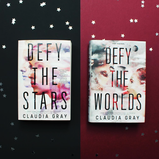 Instagram images of the books "Defy the Stars" and "Defy the Worlds" by Claudio Gray