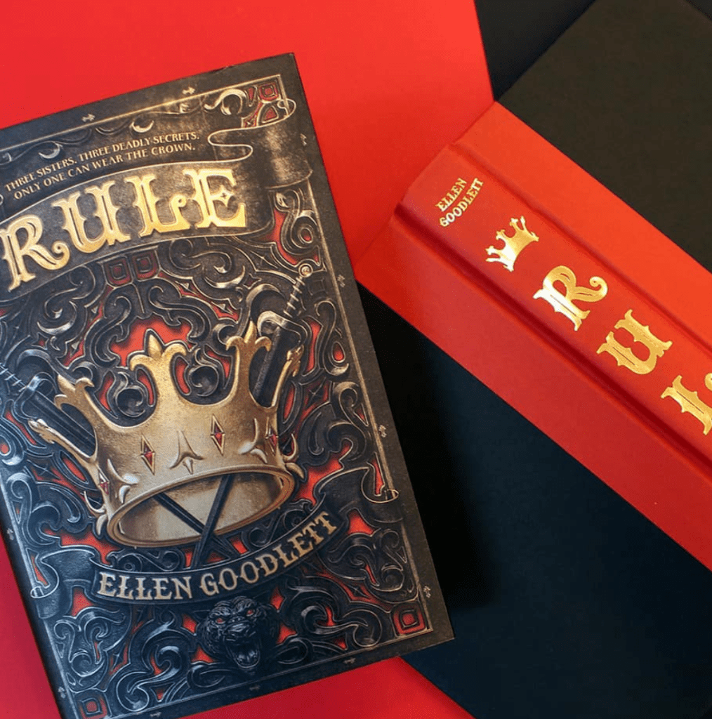 Instagram image of the hardcover spines of the book "Rule" by Ellen Goodlett