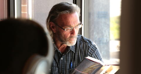 man reading a book